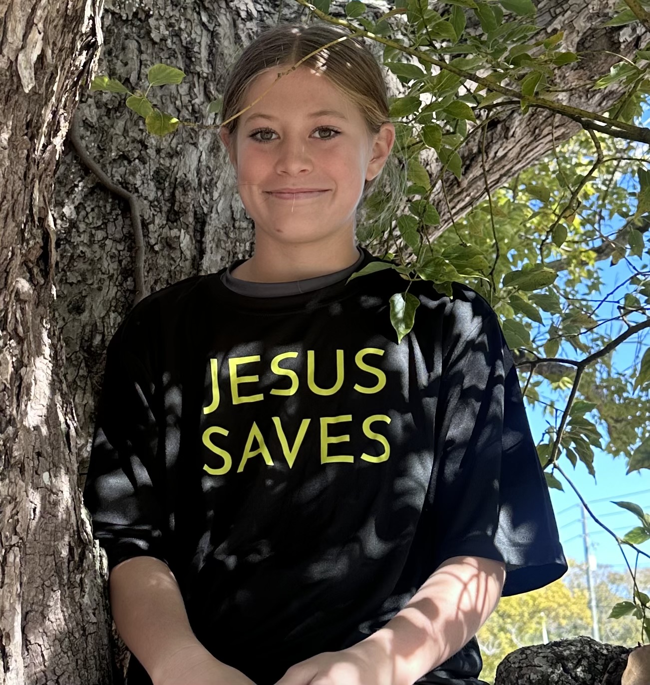 Team praying with community members